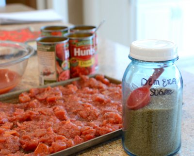 Roasting the tomatoes for Winter Tomato Soup ♥ KitchenParade.com.