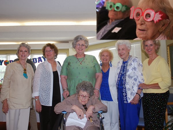 Helen Simmons Puts on Spectacles Specially Made for Her at 100 Years