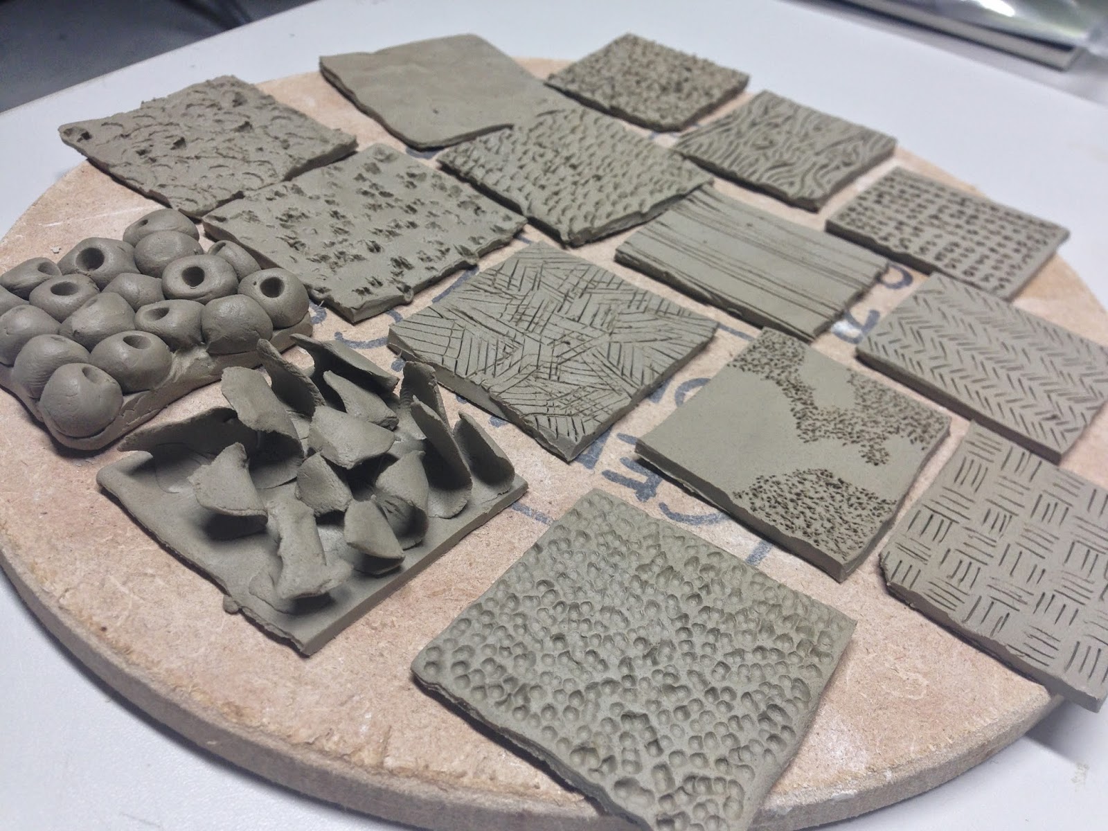 six weeks of shells mark making tiles.