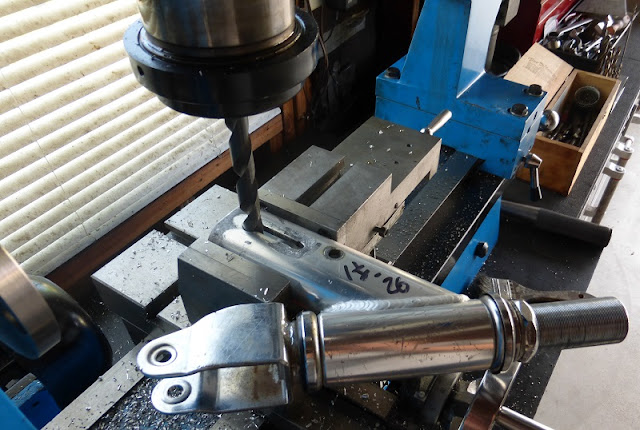 drilling a hole in scooter part for bushing