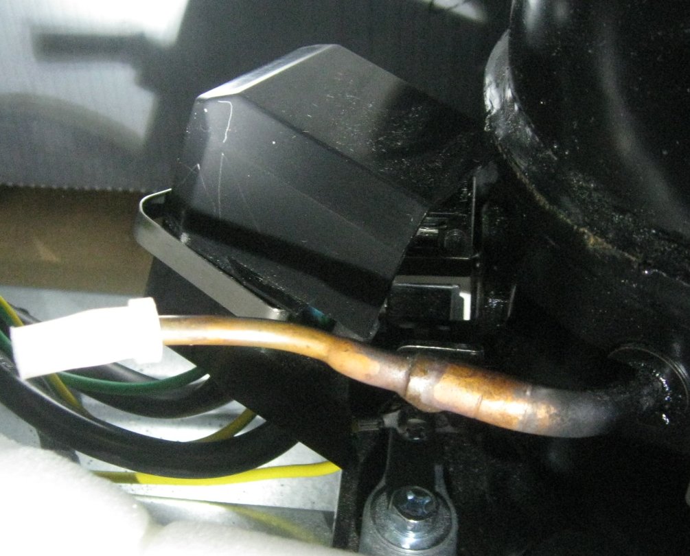 Little Tinker Fixing an Emerson mini refrigerator