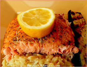 Grilled Cedar Planked Salmon, a healthy and flavorful dinner. Lightly marinated, then grilled on a cedar plank. | Recipe developed by www.BakingInATornado.com | #recipe #dinner #fish