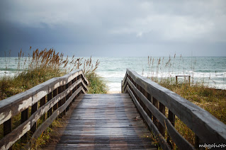 wood walkway to the beach & ocean photo by mbgphoto