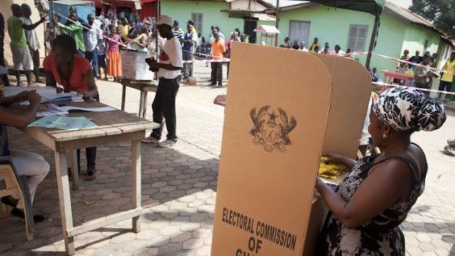 People cast their votes in elections at a polling Ghana station