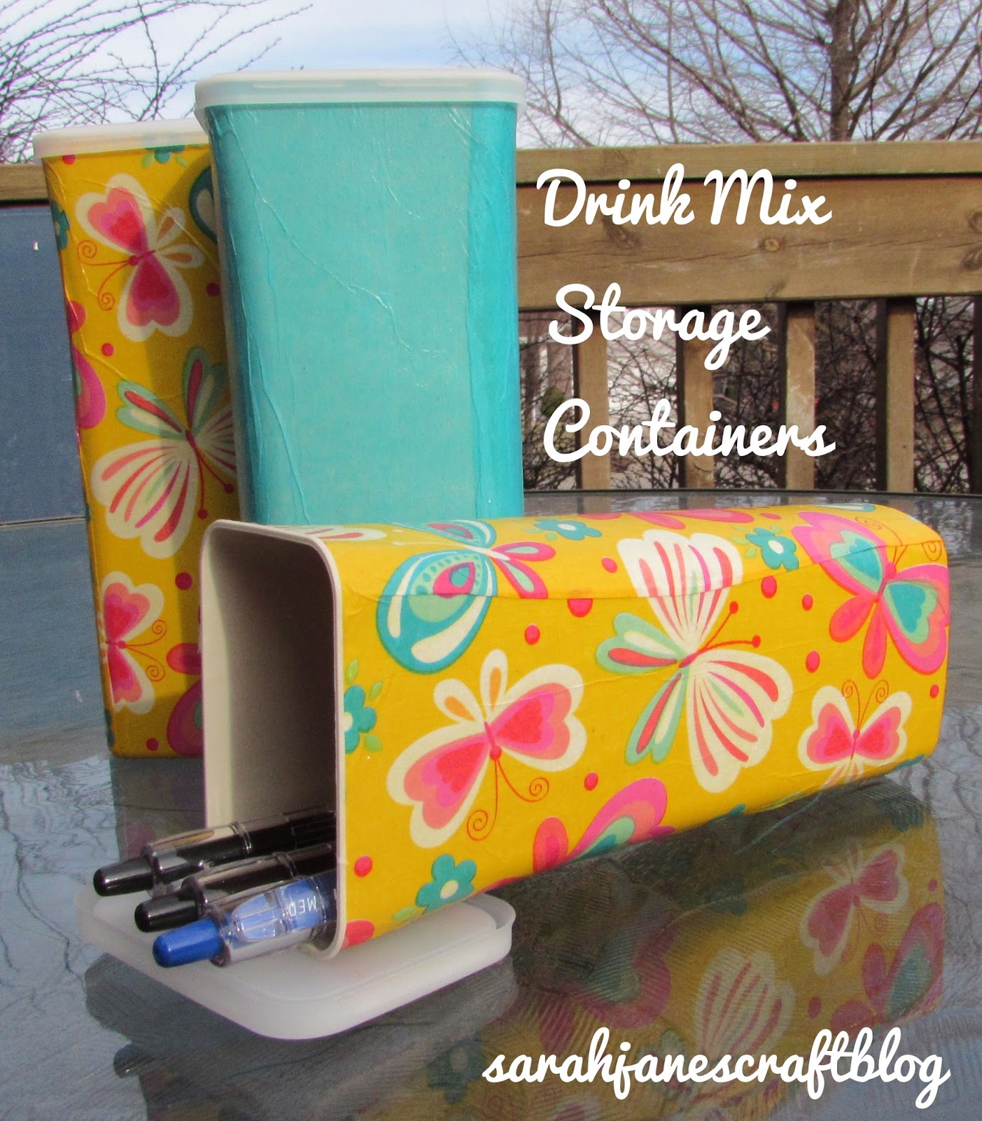 Tissue Paper and Mod Podge on Drink Mix Containers