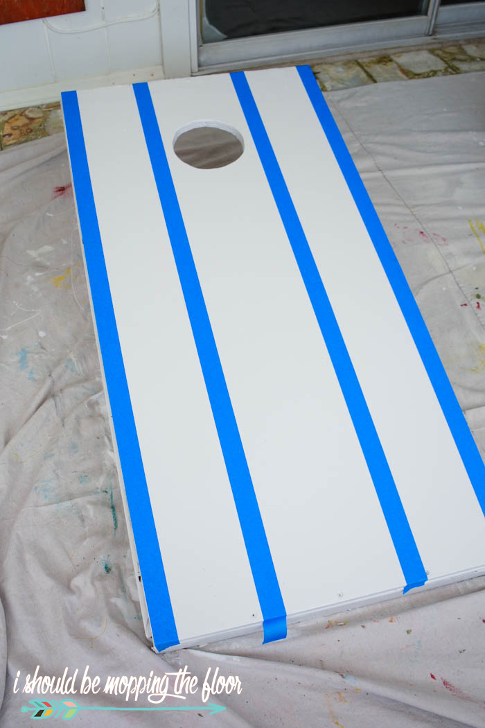 Painting Cornhole Boards  i should be mopping the floor