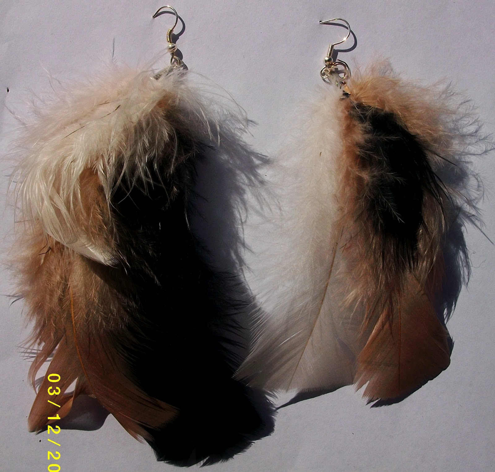 Curious Culture Clothing: Feather earrings