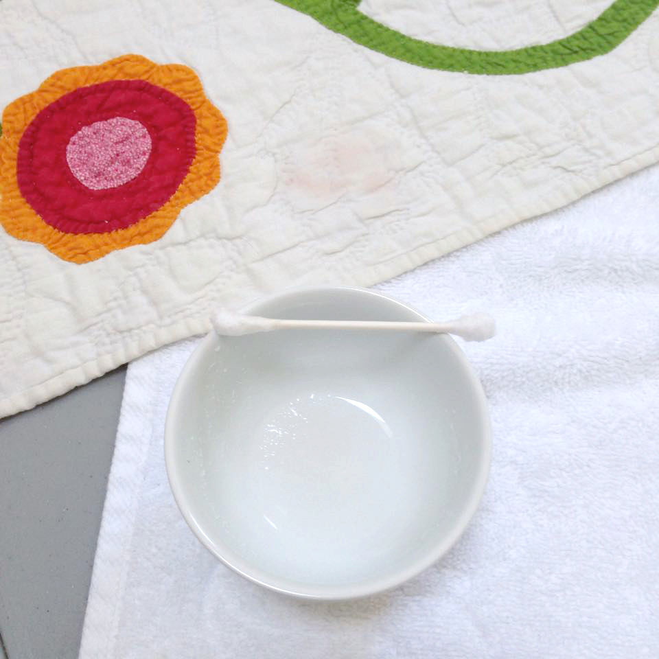 Wonkyworld treating stains in an old quilt