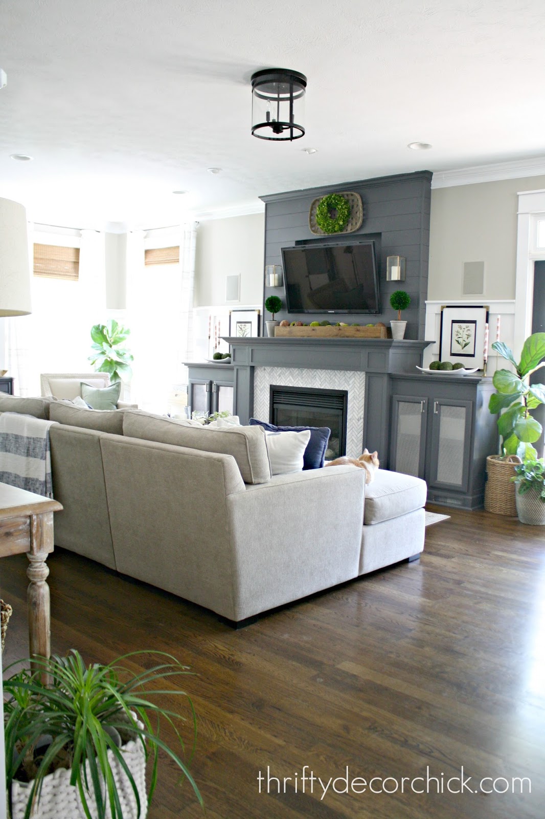 dark gray fireplace with DIY built ins