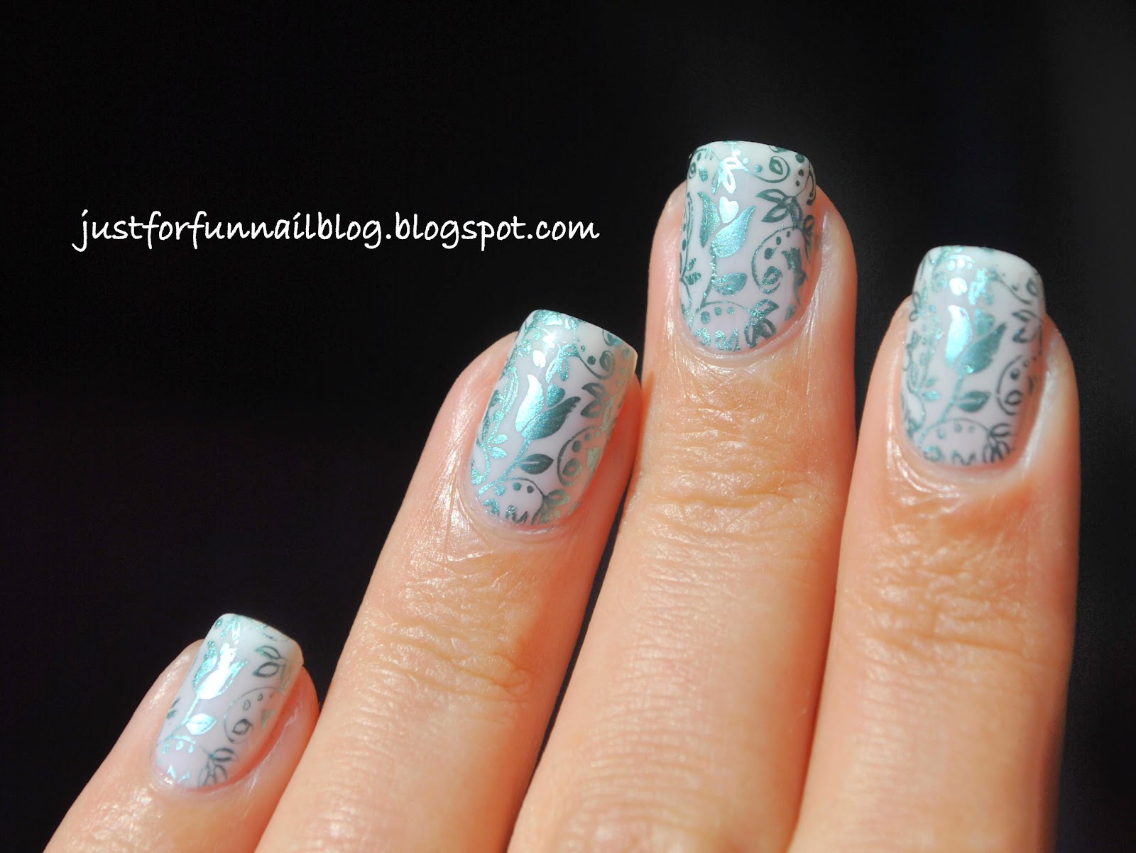 Turquoise flower stamping over white delicate base