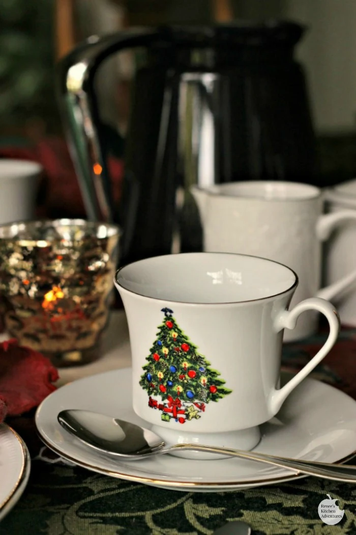 Make Ahead Christmas Morning Breakfast Casserole Christmas place setting with coffee cups 