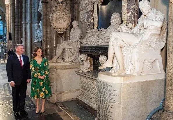 Princess Eugenie of York wore a green floral dress by Alice & Olivia with long sleeves that reached her knees.