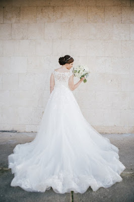 bridal photo featuring wedding dress train