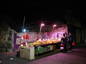 fruit stand at night in Zhongshan, China