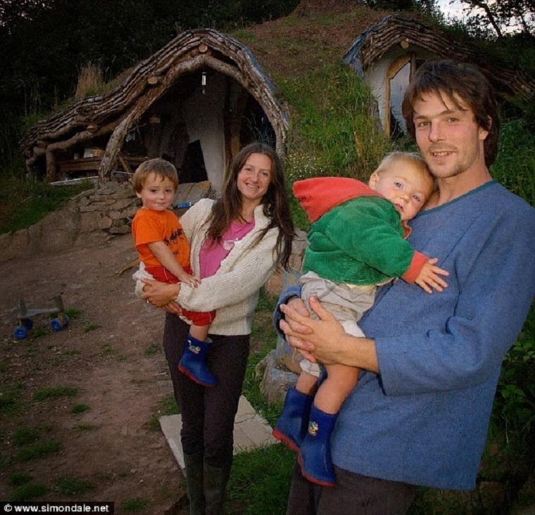 Man Builds Fairy Tale Home for His Family – Total Cost £3,000 - Simon Dale, his wife Jasmine Saville, and their two children.