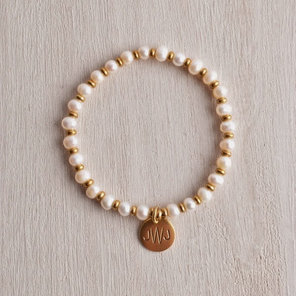 http://www.whitetrufflestudio.com/collections/bracelets/products/white-truffle-monogram-pearl-bracelet