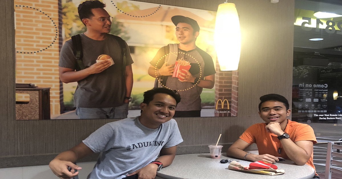 Friends put fake McDo poster of themselves on wall