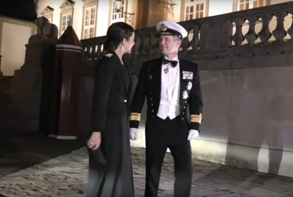 Crown Princess Mary is wearing a tailored jacket honoring the Navy officers. Crown Prince Frederik attended the dinner