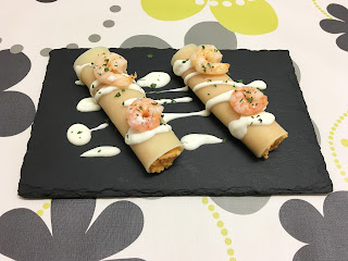 Cannelloni stuffed with seafood and prawns