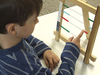 NAMC integrating older new montessori student into montessori classroom