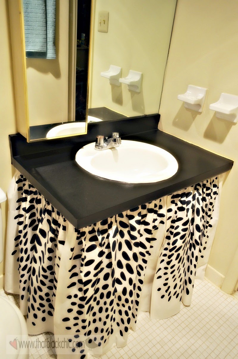 What's black, white and a touch of Teal? Mori's bathroom make-over ...