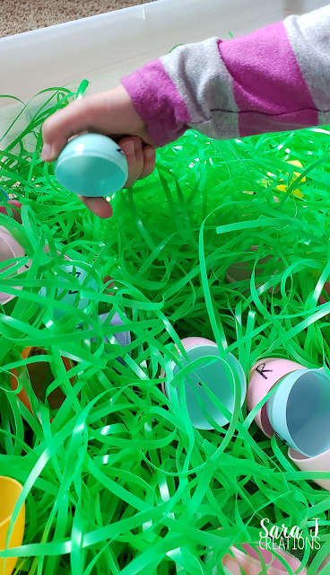 Alphabet match sensory bin is a simple spring bin for preschool or kindergarten that focuses on matching upper and lowercase letters.