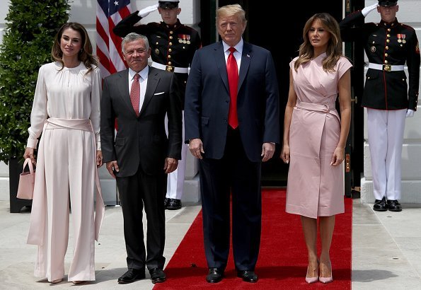 Queen Rania wore a baby pink jumpsuit by Adeam. First Lady Melania Trump wore a pink sleeveless wrap around dress by Proenza Schouler