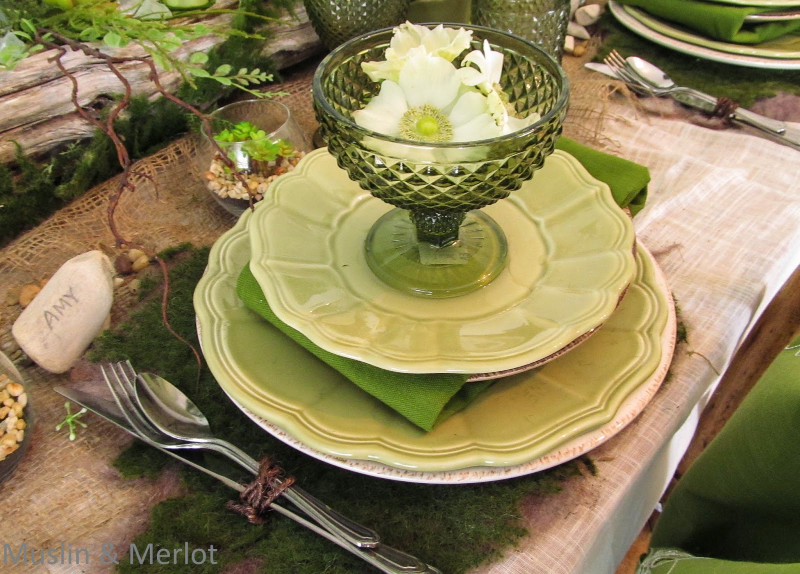 Lovely green place setting. Carved driftwood place cards.