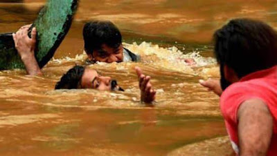 fishermen in Kerala floods rescue