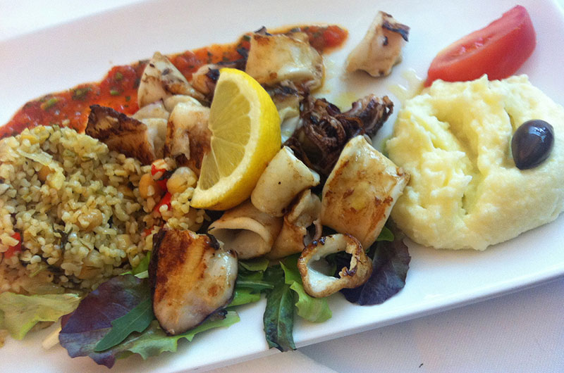 Grilled Calamari among a wonderful yummy plate