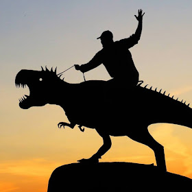 04-T-Rex-Riding-John-Marshall-Sunset-Selfie-Photographs-with-Cardboard-Cutouts-www-designstack-co