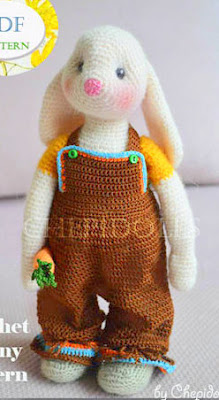 crochet amigurumi bunny boy in overalls