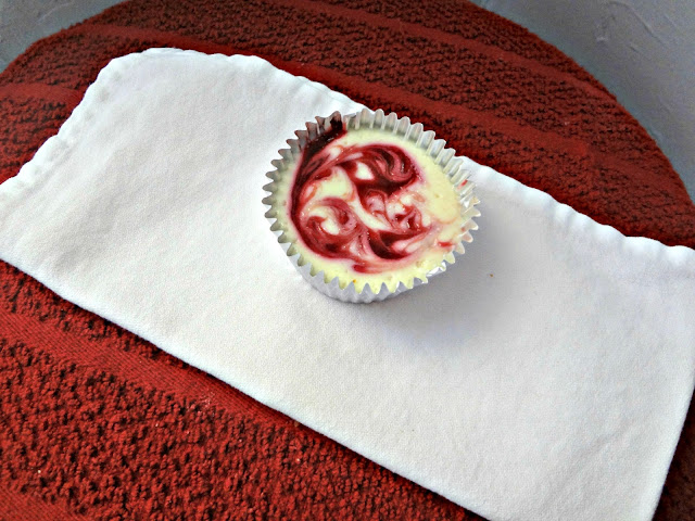 Mini Raspberry Swirl Cheesecakes