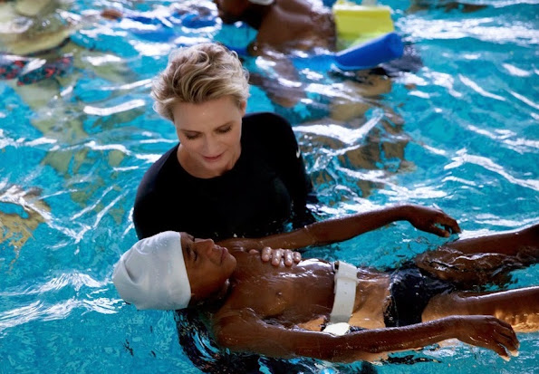 Princess Charlene of Monaco attended a activity supported from her founding at the St. Charles College's pool