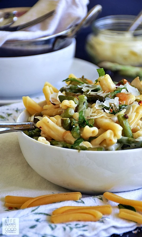 Brie and Asparagus Pasta in a white bowl ready to eat for lunch or dinner