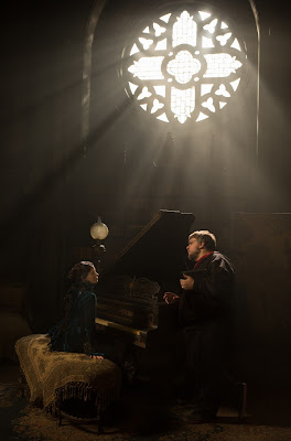 Jessica Chastain and Guillermo del Toro on the set of Crimson Peak
