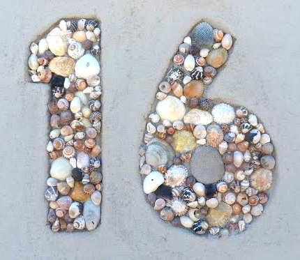 house wall with shell numbers