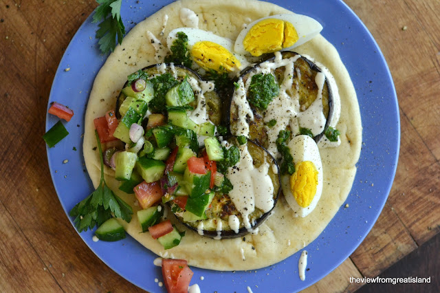 sabih, with zhoug, tahini sauce,and mediterranean chopped salad