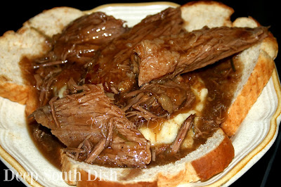 An open-faced hot roast beef sandwich, made with a rump roast and served with white bread, homemade mashed potatoes and topped with gravy.