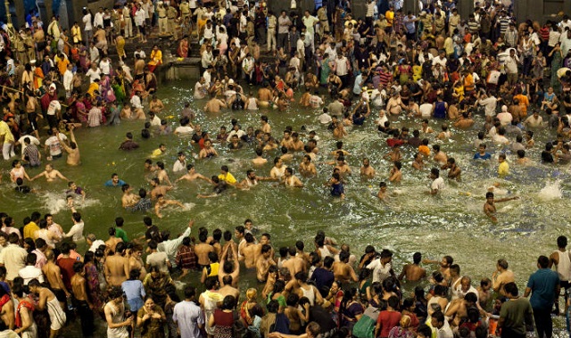  Kumbh Mela is a colossal gathering of huge expose of devotees at a designated spot every  Place to visit in India: Ujjain Kumbh Mela 2016 Travel Guide