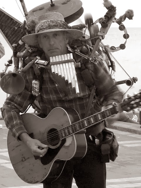 Street musician in Key West, FL.  Photo via WikiMedia
