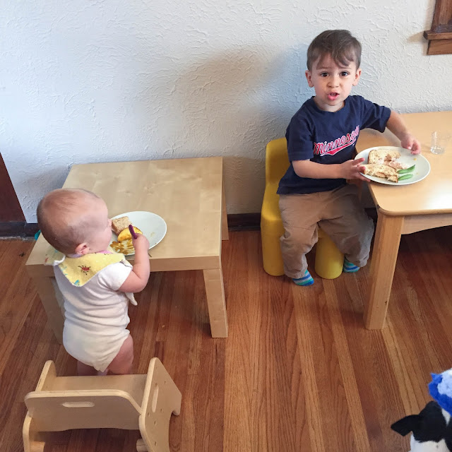 Montessori babies eat at small tables while still enjoying family means. The Montessori weaning table has many benefits for babies including promoting independence and cooperation among siblings.