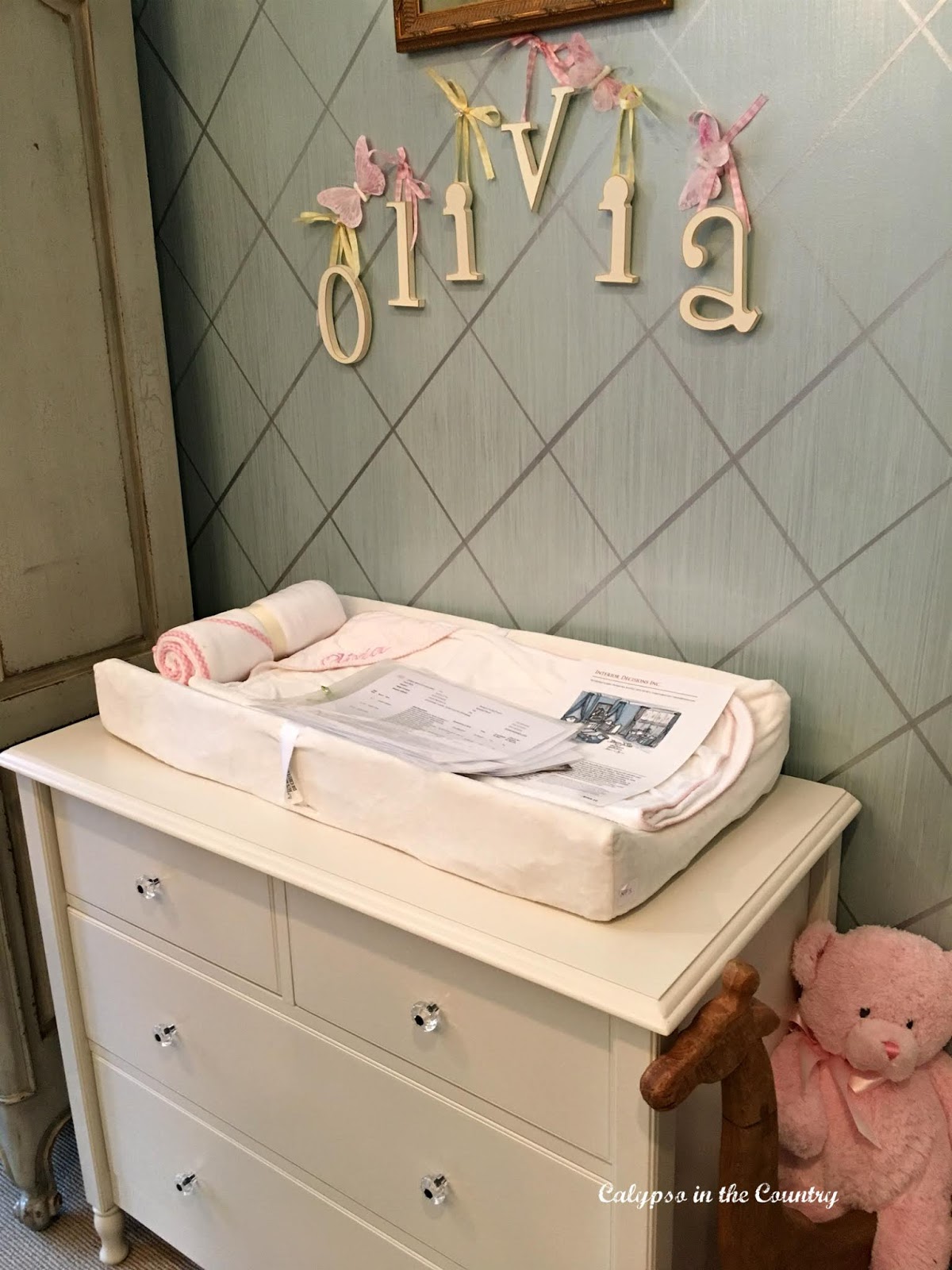 Changing table in baby girl room