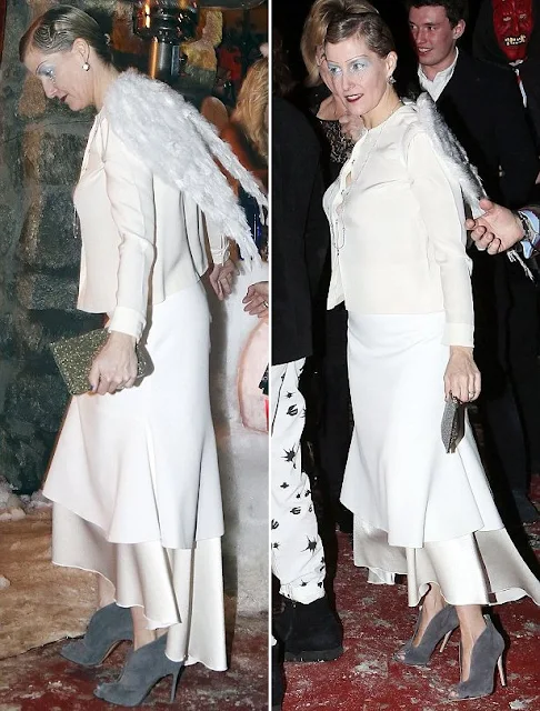 The Countess wore a layered white skirt by Ellery- Suzie, a cream blouse by Emilia Wickstead which se had worn before a few times and a gray suede boot by Gianvito Rossi.