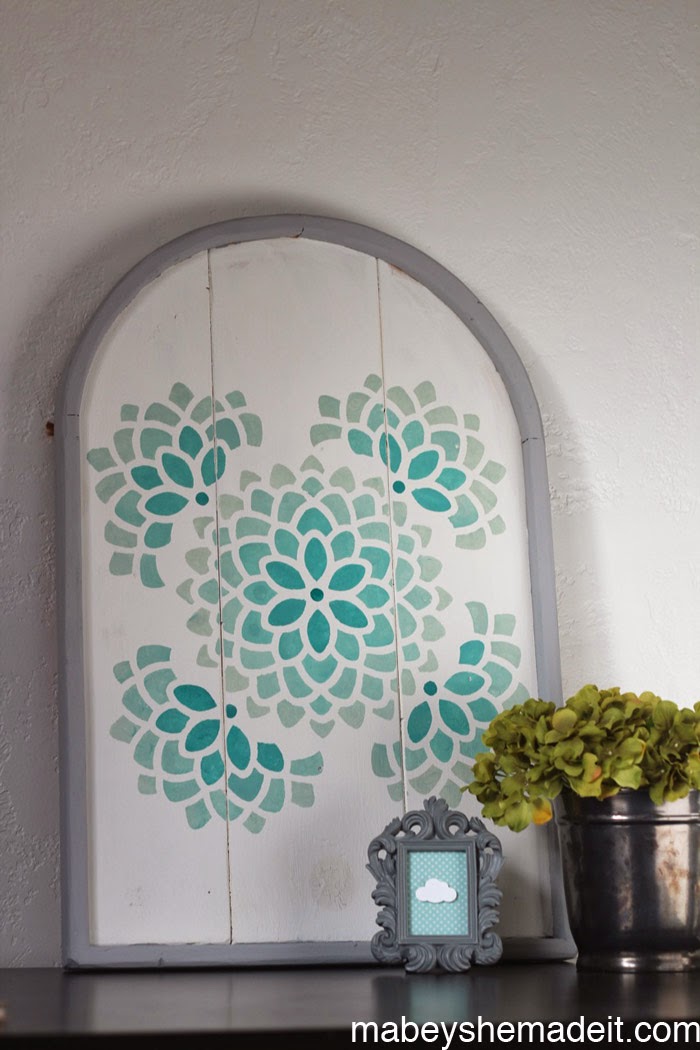 http://www.mabeyshemadeit.com/stenciled-arch-tutorial-with-ombre/
