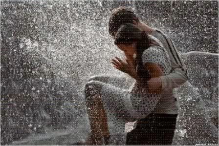 A romantic couple in the rain