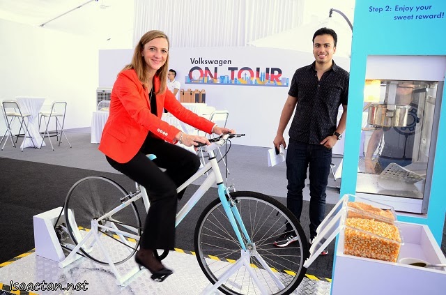 Yet another creative fun station, shown here Ms Petra Schreiber, Director, Marketing & Communication, Volkswagen Malaysia cycling to pop some popcorns