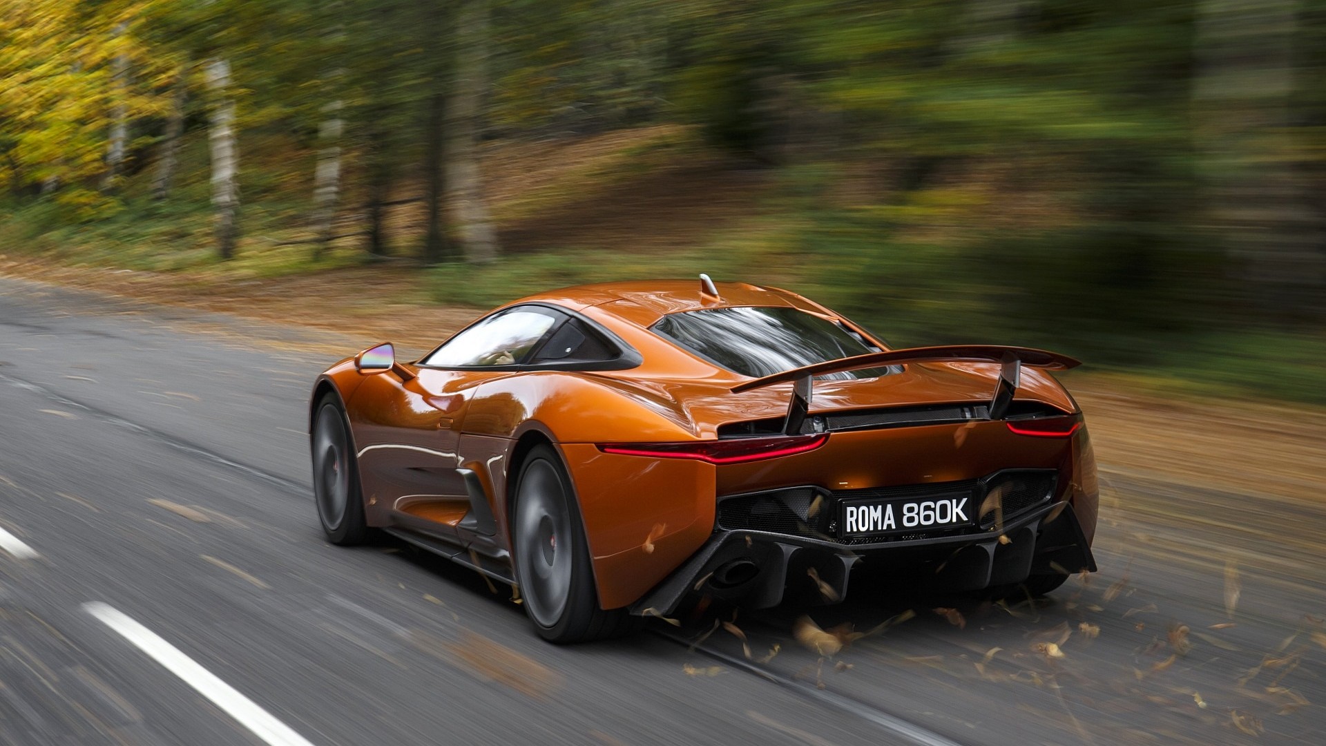 спортивный автомобиль оранжевые Jaguar C-X75 загрузить