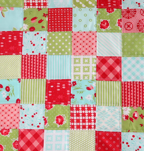 Christmas Patchwork Pillow tutorial by Andy of A Bright Corner - a fun and quick scrap fabric project