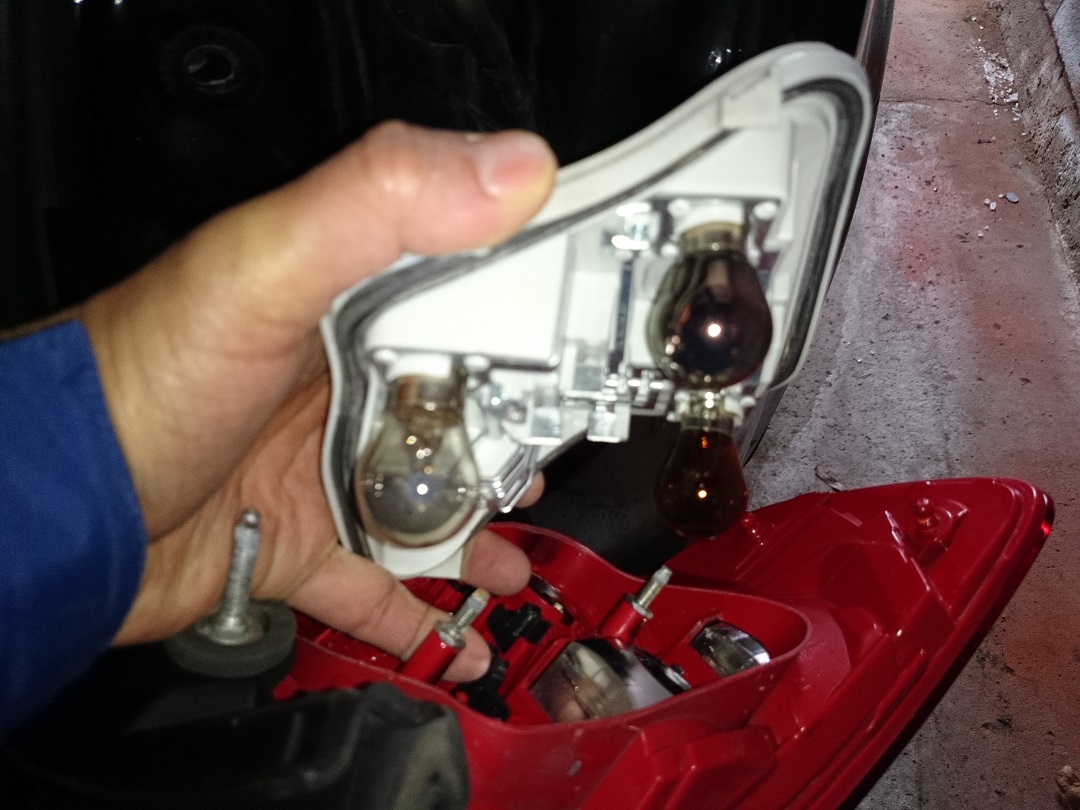 John Koshy Oh, oh time to replace the right brake light bulb in